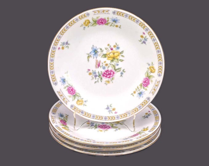Four Liling Ling Rose salad plates.