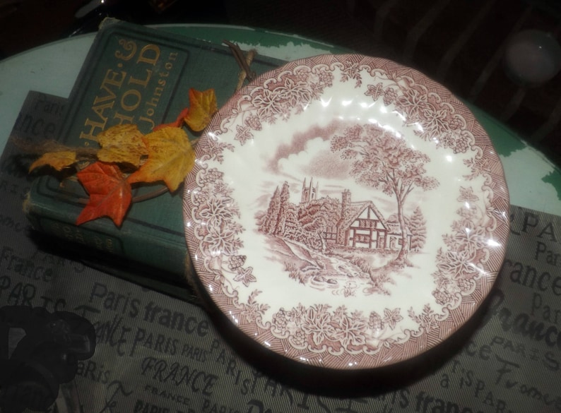 landscape scene. Red transferware bread-and-butter or side plate Vintage 1982 Tudor cottage Myott The Brook Pink
