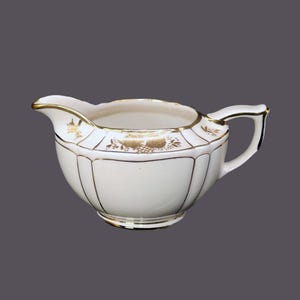Sadler Creamer kan uit 1992, gemaakt in Engeland.