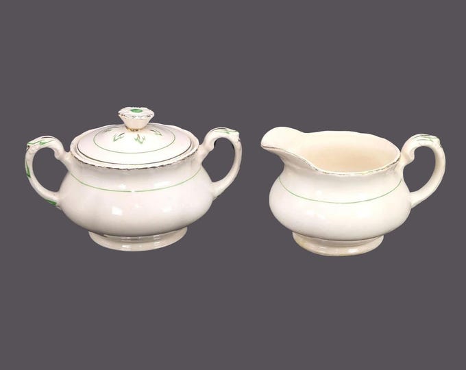 Art-deco era Grindley GRI93 creamer and covered sugar bowl. Cream Petal ironstone made in England.