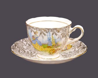 Vintage Colclough CLC10 Crinoline Lady bone china cup and saucer set made in England.