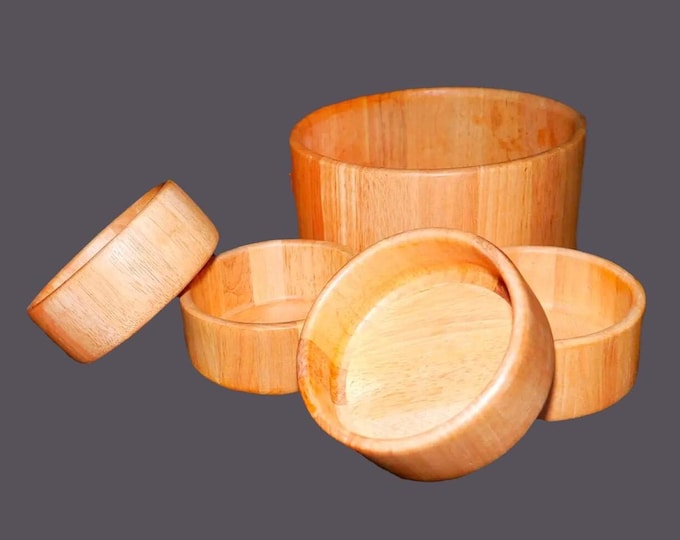 Five solid teak salad bowls made in Thailand by Goodwood. Large serving bowl, four individual bowls.