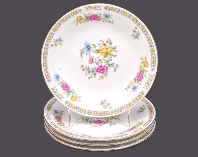 Four Liling Ling Rose salad plates.