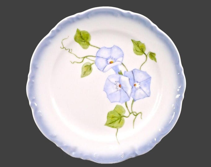 Hand-painted Mitterteich luncheon plate. Central blue florals, greenery, embossed blue rim. Signed dated to reverse Monsus 1994.