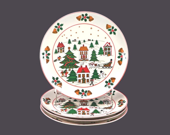 Four Christmas Pleasure style JAP97 salad plates made by Fine China of Japan.