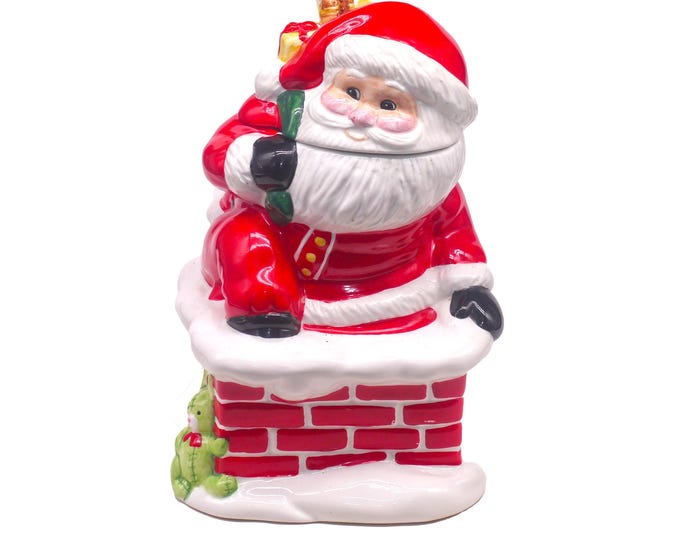 Vintage Frosty Santa Claus ceramic Christmas cookie jar.