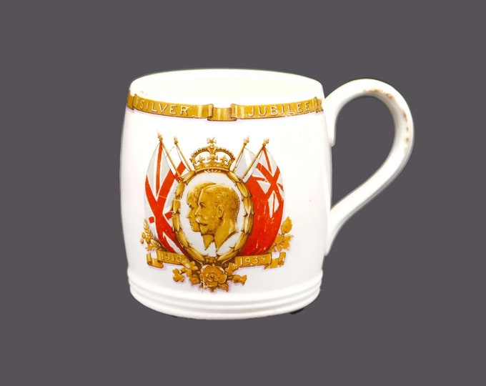 King George V & Queen Mary Silver Jubilee 1935 commemorative mug made by John Maddock in England. Flawed (see below).