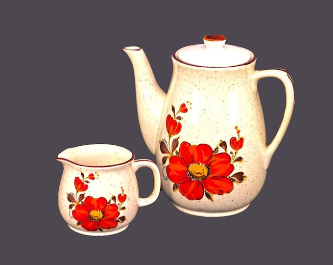 Japan Stoneware Valencia tall six-cup coffee pot and creamer jug. Flaw (see below).