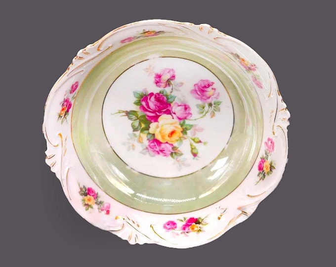 German lusterware round serving bowl. Pink, yellow roses, green band, embossed scalloped, gold edge. Flaw (see below).