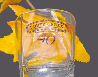 Vintage 40 Creek Canadian Whisky lo-ball glass. Etched-glass branding.