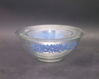 Three Pyrex PYR39 blue-and-white glass mixing bowls made in the USA. Etched-glass blue flowers and ribbons.