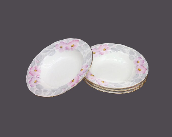 Four Royal Swansea Morning Glory rimmed soup bowls made in England.
