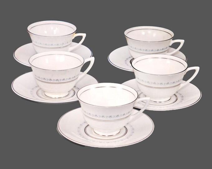 Five Royal Doulton Tiara H4915 bone china cup and saucer sets made in England.