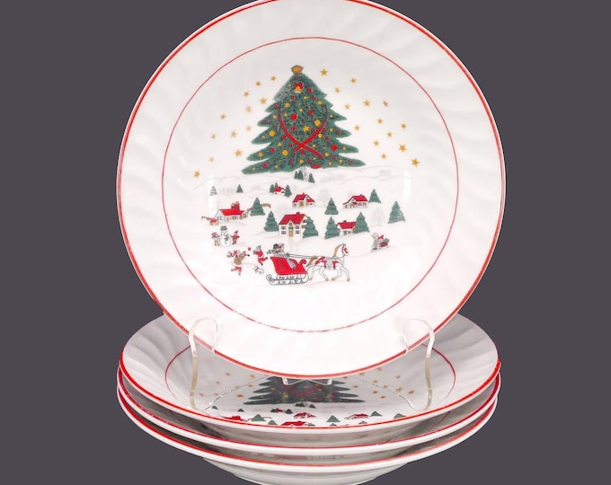 Four Royal Heritage Christmas Pleasure | Christmas Village coupe soup bowls with red trim.