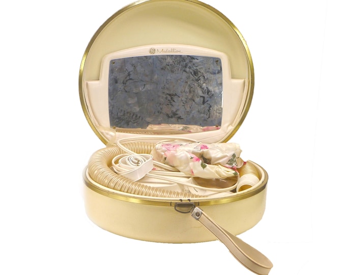 General Electric Medallion Hair Dryer in travel case. Built-in mirror, curler attachment, nail dryer. Original Sally Victor bouffant bonnet.