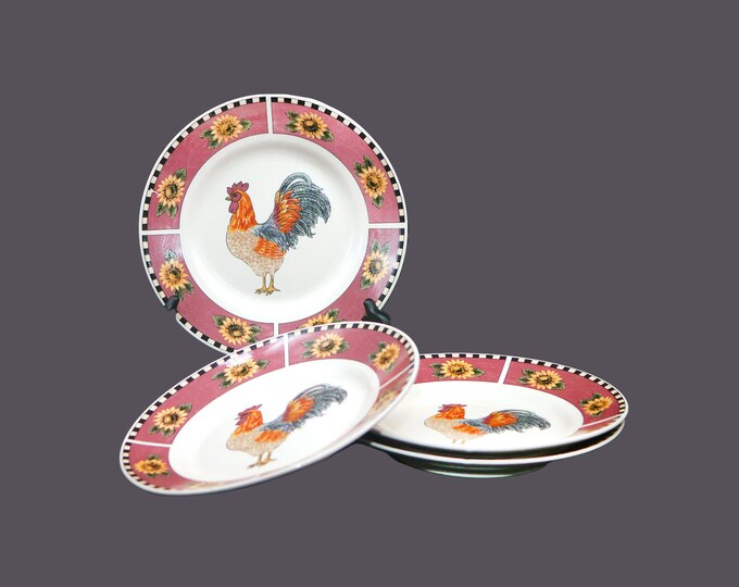 Four Gibson Brewster large salad plates. Central rooster.