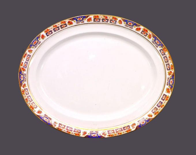James Kent Fenton 551 Imari turkey platter made in England. Flaws (see below).