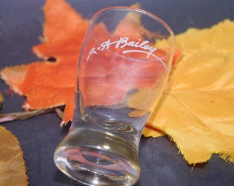 Vintage Baileys Irish Creme single shot glass. Etched-glass R.A. Bailey signature in white.
