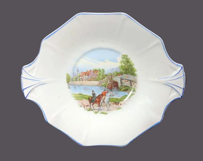 Hollinshead & Kirkham 3879 lugged serving plate. Dogs horses people, blue trim. Made in England. Minor flaw (see below).
