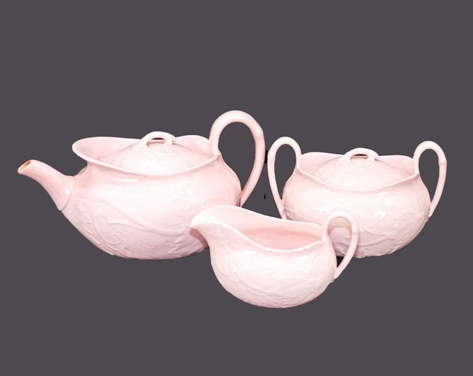 Wedgwood Alpine Pink Embossed four-cup tea pot, creamer and covered sugar bowl made in England.