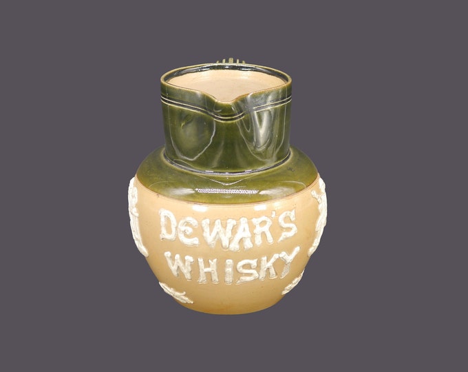 Antique Edwardian Age Royal Doulton salt-glazed pitcher advertising Dewars Scotch Whisky made in England.