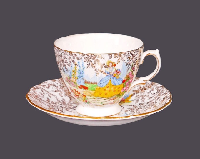 Colclough CLC10 Crinoline Lady bone china cup and saucer set made in England. Flaw (see below).