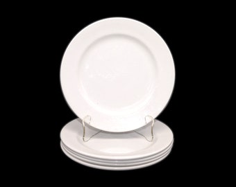 Five Royal Doulton Capital White Chef's favorite all-white salad plates. Doulton Hospitality hotel | restaurantware.