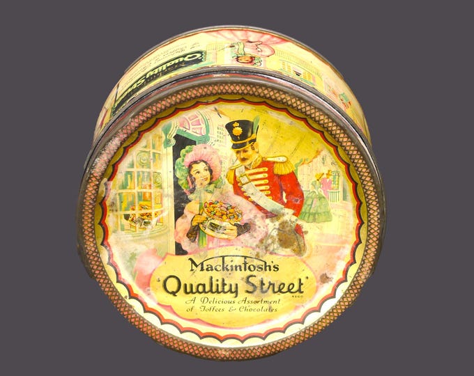 Art-deco era Mackintosh's Quality Street small, round candy tin. Miss Sweetly and Major Quality. One of the early tins for this brand.