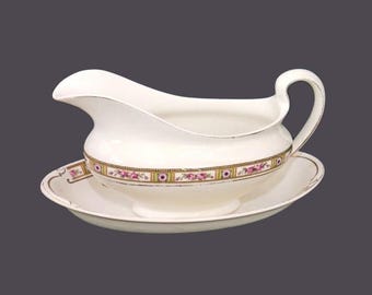 Antique Johnson Brothers Ormsby gravy boat and under plate made in England.