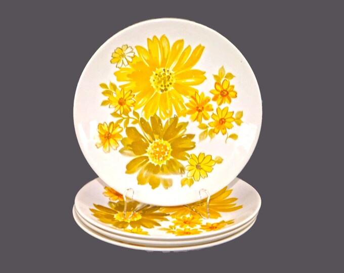 Four retro Crown Lynn Topaz salad plates made in New Zealand.