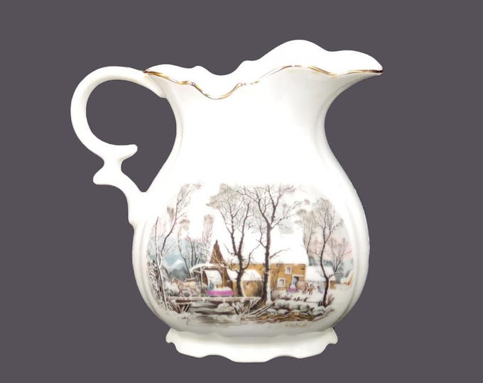 Avon Currier & Ives Christmas pitcher made in Japan. Gold edge, accents.
