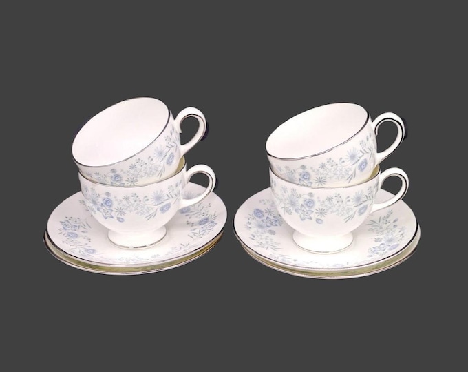 Four Wedgwood Belle Fleur R4356 bone china cup and saucer sets made in England.
