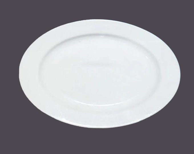 Lubiana Kaszub oval steak, burger, sandwich platter. Chef's favorite all-white hotelware | restaurantware made in Poland.