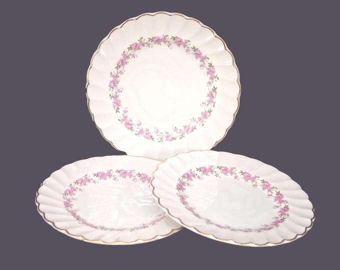 Three Myott Pink Petite bread plates made in England. Crazing (see below).