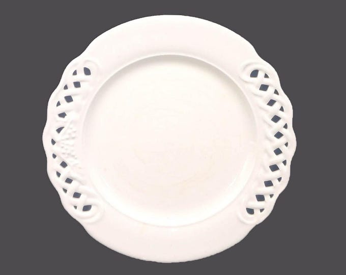 Pier 1 PER14 Chef's favorite all-white dinner plate made in Italy. Pierced rim. Sold individually. Crazing (see below).