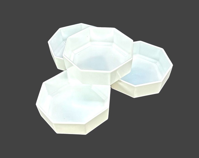 Four Arcopal Novoctime White multi-sided Chef's favorite all-white cereal bowls made in France. Soft edge, eight-sided.