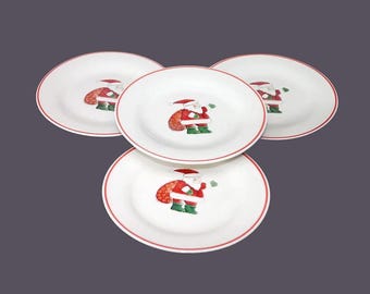 Vintage CX733 stoneware salad plates. Christmas Folk-art Santa center.