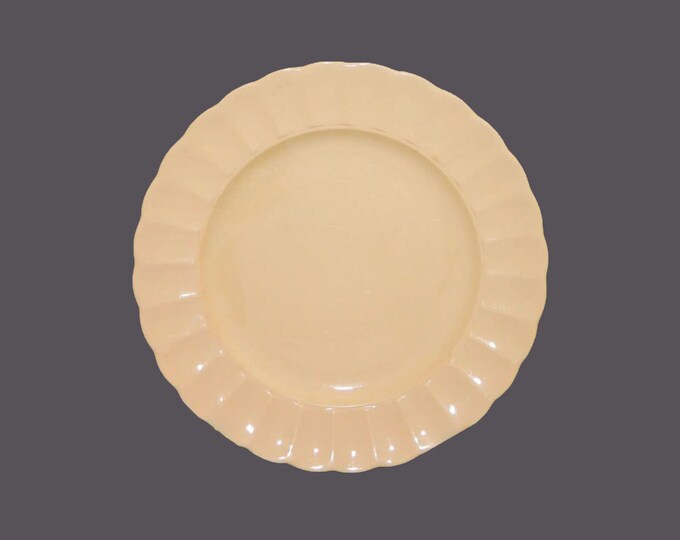 Sovereign Potters Morn Glo all-yellow small dinner or luncheon plate. English ironstone decorated in Canada.