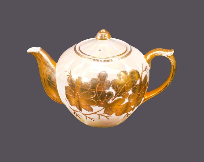 Pearlized iridescent lusterware gold moriage four-cup teapot. Attributed mid-century Japan.