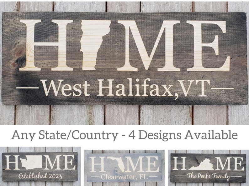 A 9x24" wood sign, design is engraved within the wood, top line says HOME in all capitals with a chosen state/country replacing the O, the second line has 5 custom design options- 1. Sweet Home 2.