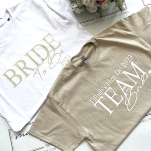T-shirt poule TEAM BRIDE, cadeaux de mariage escouade mariée, T-shirt EVJF, hauts de poule, mariée TRIBE, t-shirts poule, demoiselle d'honneur, paillettes, T-shirt femme,