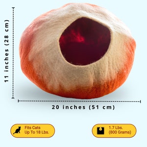 May include: A large, round, orange and white felt cat bed with a large opening. The bed is 20 inches wide and 11 inches tall. It can fit cats up to 18 pounds and weighs 1.7 pounds.