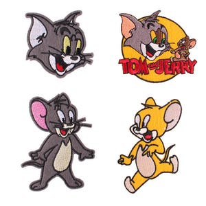 May include: Four embroidered patches featuring characters from the Tom and Jerry cartoon series. The patches include images of Tom the cat and Jerry the mouse in various poses, with vibrant colors and detailed stitching. One patch has the words "Tom and Jerry".