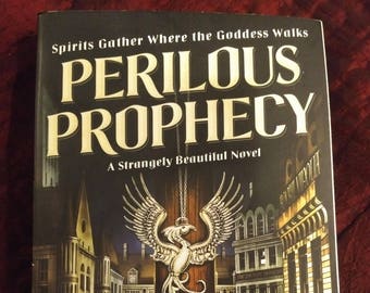 Signed, personalized copy of PERILOUS PROPHECY, a Strangely Beautiful novel. This is the revised new edition via Tor Books