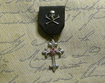 Skull & Cross: Pirate / Gothic Medal with Cross Pendant with Crimson Crystal, Skull and Crossbones Set on Black Ribbon Pin