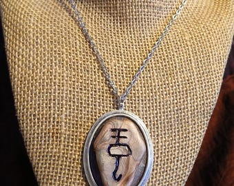 Bold Vulcan Script "Logic" Etched Copper Polymer Clay Pendant on Iridescent Oval Enamel Decked Pewter Frame as a Halo