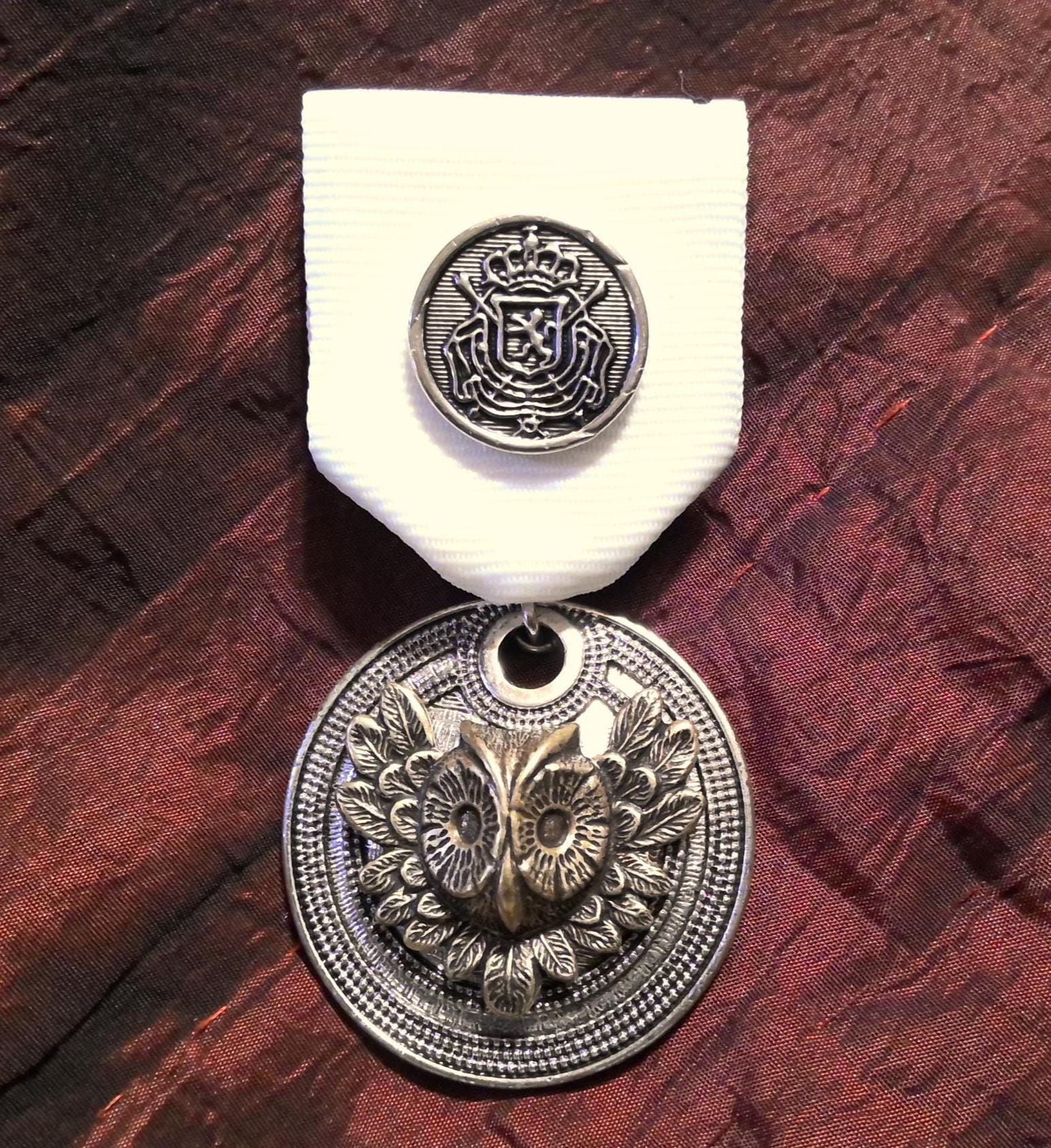 Owl & Crest: Wise Rule - Golden Medal / Award on Heraldic Blue and Green Ribbon with Pin Backing