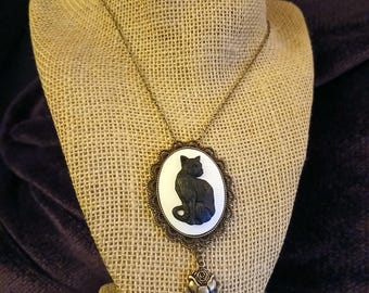 Black Cat Rose: Large, Bold Kitty Cameo Pendant - Black Cat on White Resin with Rose Blossom Detail on Brass Victorian Scalloped Frame