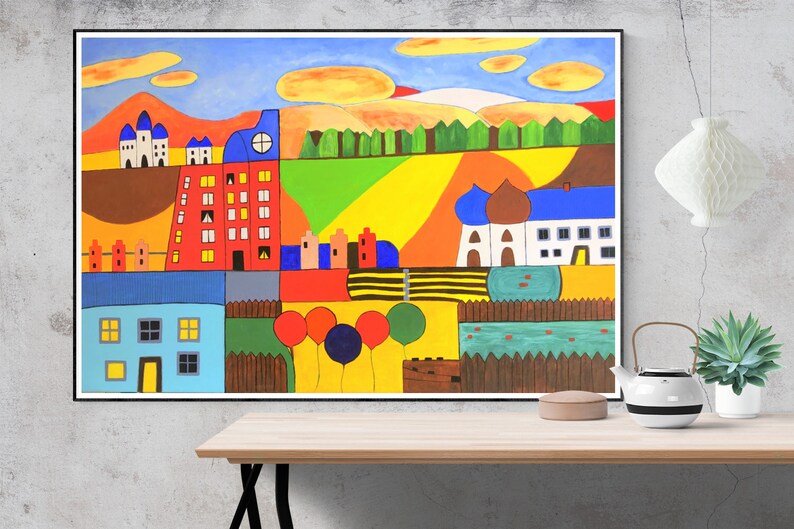 May include: A colorful abstract painting depicting a town with houses, trees, and a blue sky. The painting is done in a whimsical style with bold colors and simple shapes.