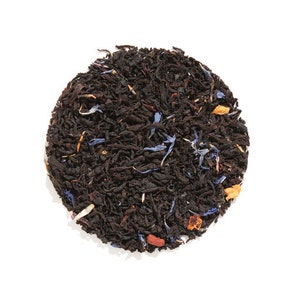 May include: A close-up of a blend of black tea leaves with blue cornflower petals and orange pieces.